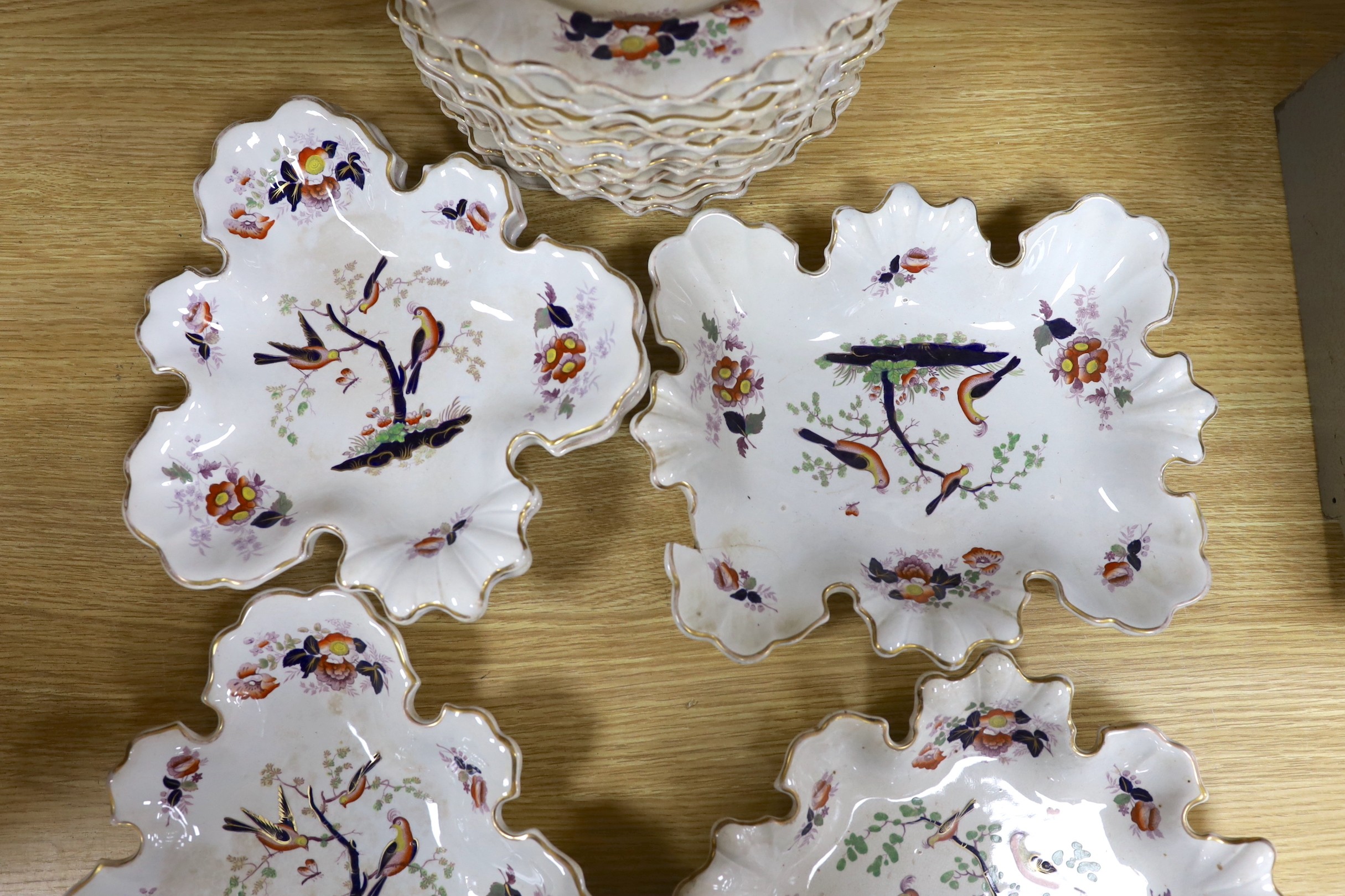 A mid 19th century opaque china dessert service by W. Baker & Co.